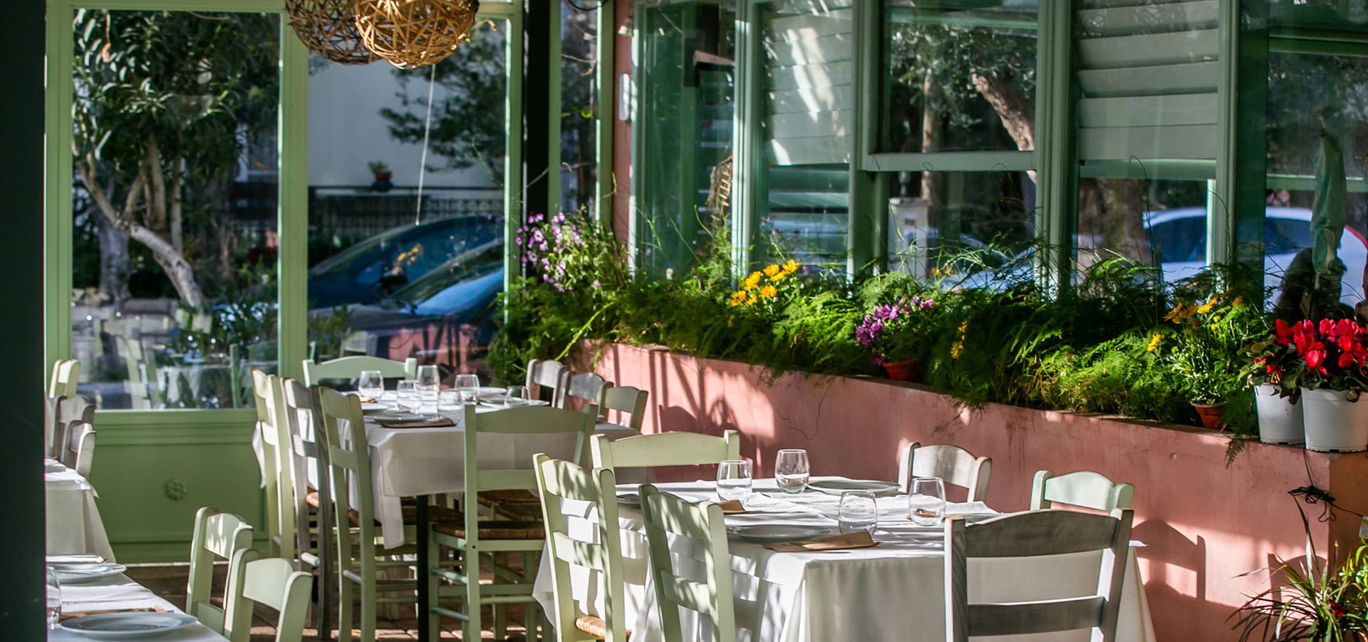 Tables set in the courtyard of O Thalassinos